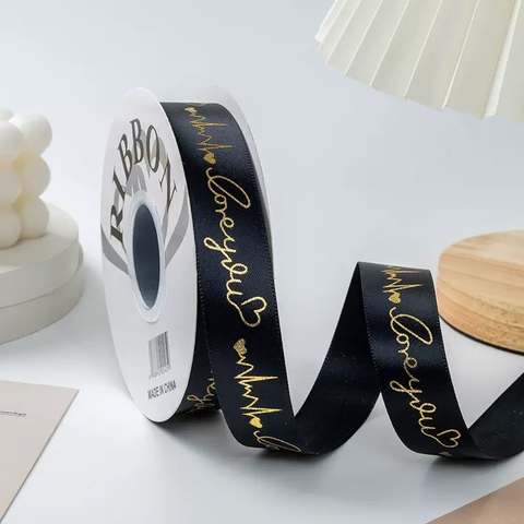 Ruybang lụa 2.5cm x 35m chữ love you gắn trái tim nhũ vàng - màu ĐEN.