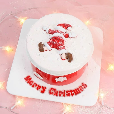 TUONG-ông già Noel nằm sấp mặt (nhựa). (kt 9.2cmx8.5cm)
