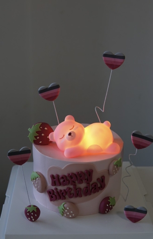 Tượng gấu hồng dáng nằm (có đèn).