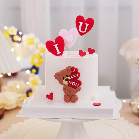 Tượng nhựa dẻo-GẤU nâu ôm chữ  I  love you đỏ.