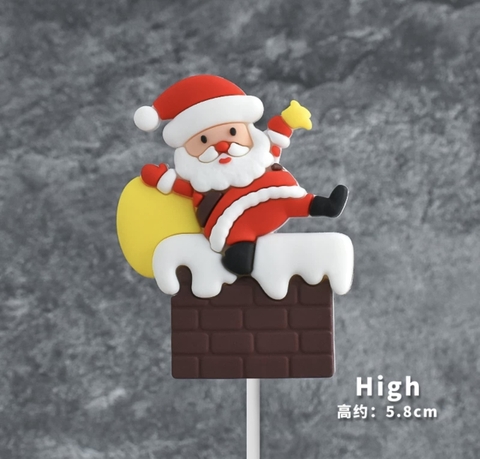 Tượng nhựa dẻo - ông già noel ngã trên ống khói.