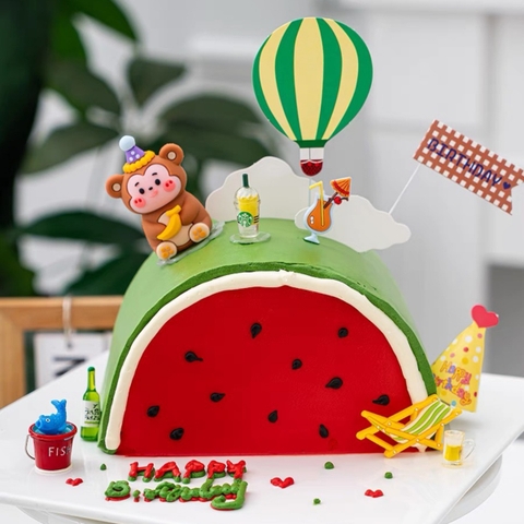 Tượng nhựa mềm size to -KHỈ chuối đội mũ.