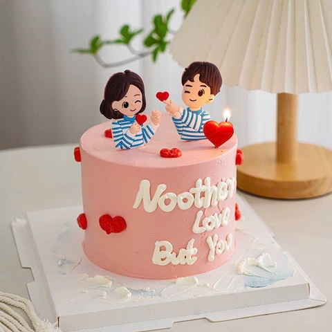 Tượng nhựa dẻo - đôi nam nữ áo kẻ xanh thả tim.