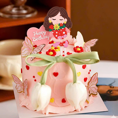 Tượng nhựa dẻo-mẹ ôm hoa.