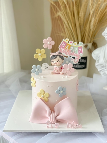 Tượng em bé GÁÍ cài nơ hồng (NHỰA CỨNG).