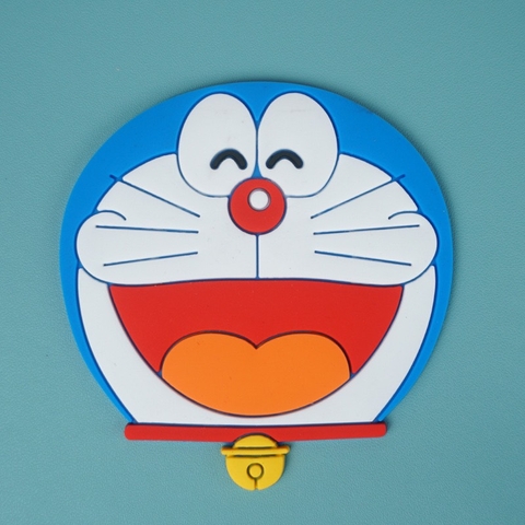 Mặt Doremon cười nhựa dẻo (kt TO 8x7cm).