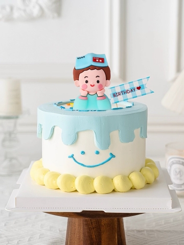 Tượng nhựa dẻo loại dày-bé TRAI đội sách (Xanh).