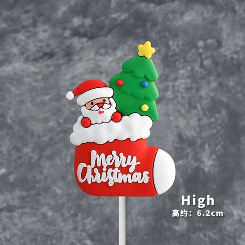 Tượng dựa dẻo- ông già noel chui vào chiếc tất.