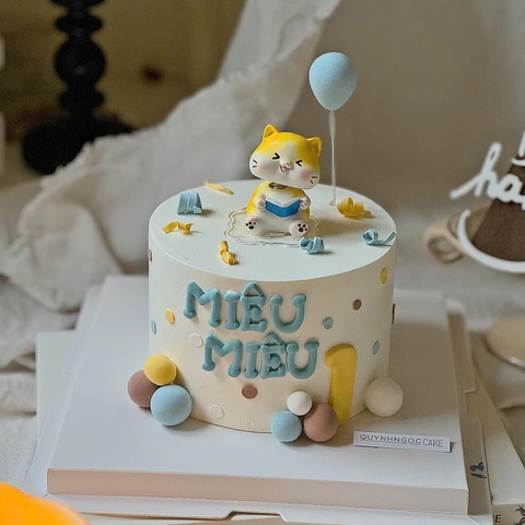 Tượng sứ - mèo VÀNG đọc sách9361.