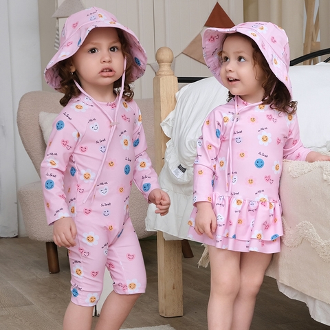 Bộ đồ bơi bé gái liền thân tay dài màu hồng, họa tiết hoa mặt cười