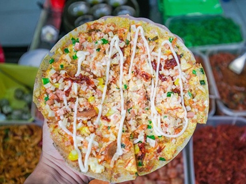 Bánh tráng nướng còn được biết đến với tên gọi rất Tây là Pizza của người Việt