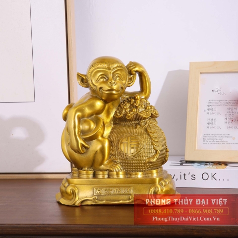 Khỉ đồng ôm túi vàng 16x13x7cm - 1.1kg