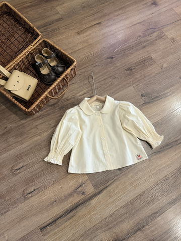 Áo sơ mi kem cổ sen