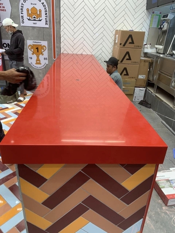 Đá solid surface korean màu đỏ ốp bàn