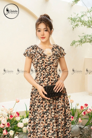 Đầm hoa sát nách đính hoa ngực màu đen