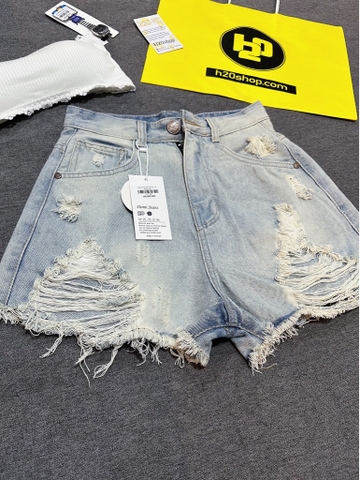 Quần short jean rách lai