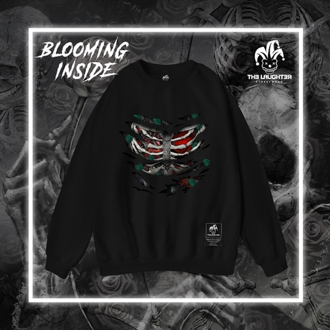 LAUGHTER BLOOMING INSIDE SWEATER