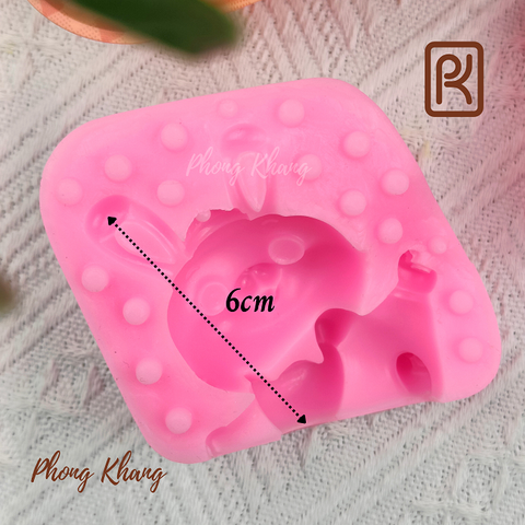 Khuôn silicon thỏ ôm thỏi vàng
