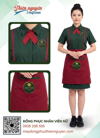 Mẫu trang phục nhân viên phục vụ nhà hàng Mai An Kim với áo sơ mi màu xanh , điểm nhấn chiếc áo  là nơ màu đỏ đô, kết hợp với tạp dề được in logo rõ nét