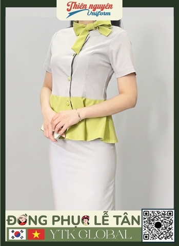 Mẫu đồng phục lẽ tân YTK GLOBAL thiết kế peplum thanh lịch phối với nơ xanh và chân váy ôm