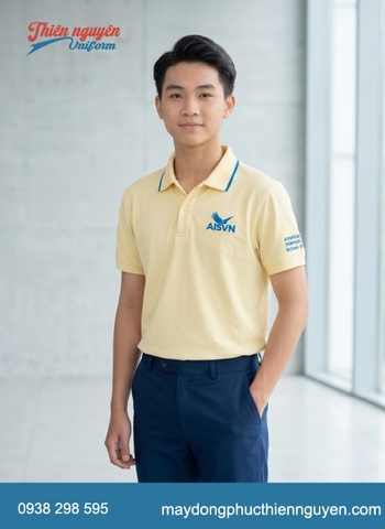 Bộ đồng phục học sinh cấp 3 trường quốc tế Mỹ AISVN với gam màu vàng chanh tươi phối với quần và chân váy màu xanh navy