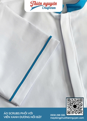Mẫu đồng phục scrubs nha khoa màu trắng phối với xanh dương tạo sự chỉn chu chuyên nghiệp của phòng khám