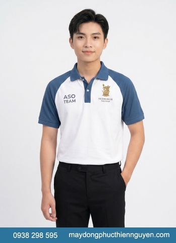 Mẫu đồng phục trường Sedbergh Vietnam - BCIS nổi bật với áo thun polo màu trắng kết hợp với xanh đậm, logo trường được thêu sắc nét