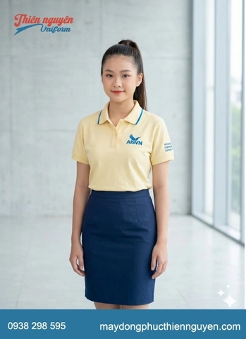 Bộ đồng phục học sinh cấp 3 trường quốc tế Mỹ AISVN với gam màu vàng chanh tươi phối với quần và chân váy màu xanh navy