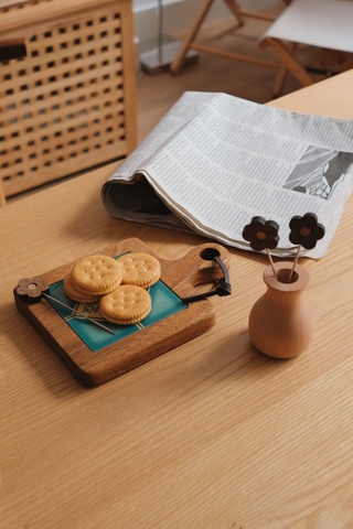 Lót ly/nồi gạch viền gỗ tay cầm