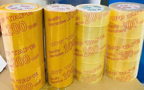 BĂNG KEO 100 YA DÀY MÀU ĐỤC & TRONG ,Mua 2 Cây Tặng Dụng Cụ Cắt Băng Keo Lớn(Ko CK)