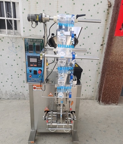 Máy định lượng bột mịn dạng trục vít.