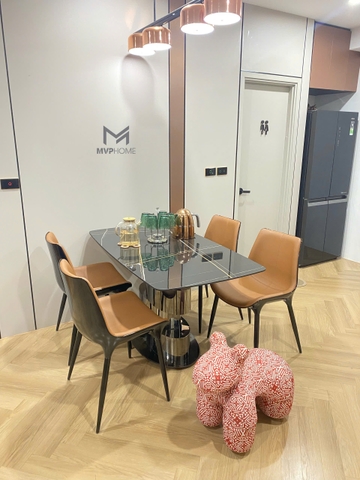 Bàn ăn cao cấp mặt đá đen chân inox xoắn