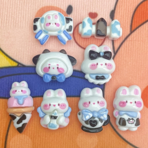 Set 100 Charm Thỏ Sữa RC1477