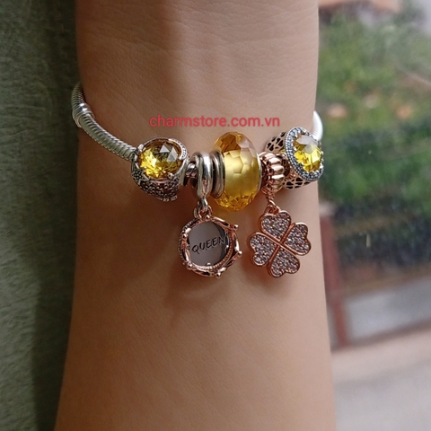 VÒNG TAY MỆNH THỔ ĐÁ VÀNG MIX CỎ 4 LÁ VÀNG HỒNG
