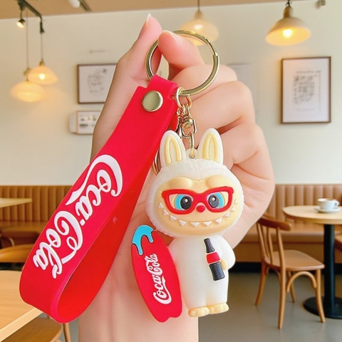 Móc Khóa labubu cầm ván - Dây móc dài : 10cm - Mô Hình Cao : 6cm - Nặng : 50gram - No Box : bọc túi OPP K76-T6-S4