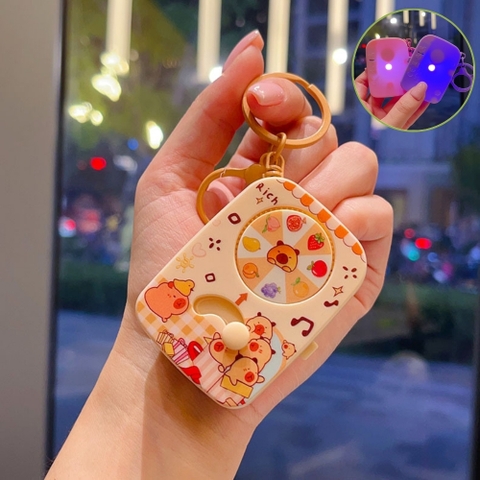 Móc Khóa gạt xoay nâu nhạt capybara vàng ( Có Đèn ) - Dài 6.3cm , Rộng 4.5cm - Nặng 50gram - SKU : moc286e K76-T4-S5