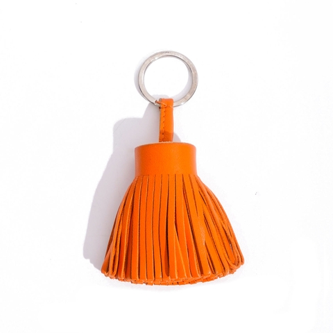 Charm Hermès Tassel Swift Màu Cam Khóa Trắng