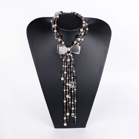 Dây Chuyền Chanel Họa Tiết Nơ Trước Cổ Màu Trắng Khóa Trắng