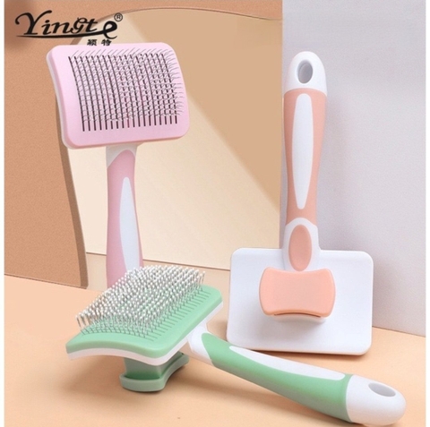Lược chải lông thú cưng Yingte nút đẩy lông có hộp