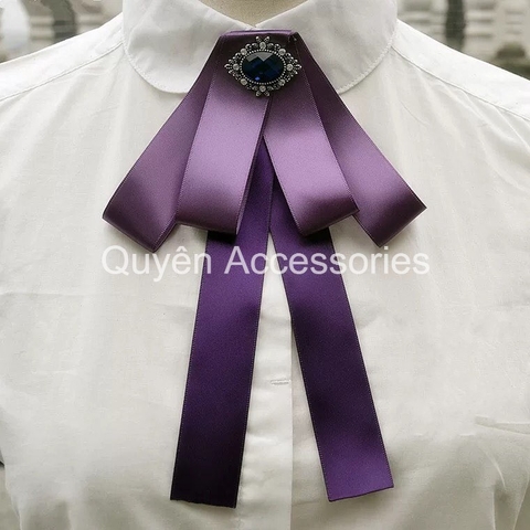 Nơ cổ áo tím đính đá