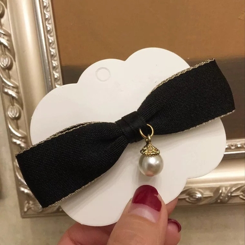 Kẹp tóc nơ xinh đính ngọc đen