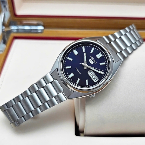 Seiko Automatic SNXS77K1 Dây Thép Vỏ Trắng Mặt Xanh