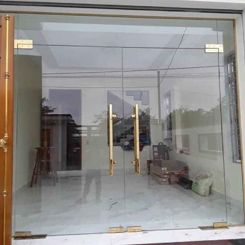 CỬA BẢN LỀ SÀN 2 CÁNH THỦY LỰC KÍNH CƯỜNG LỰC 10 mm
