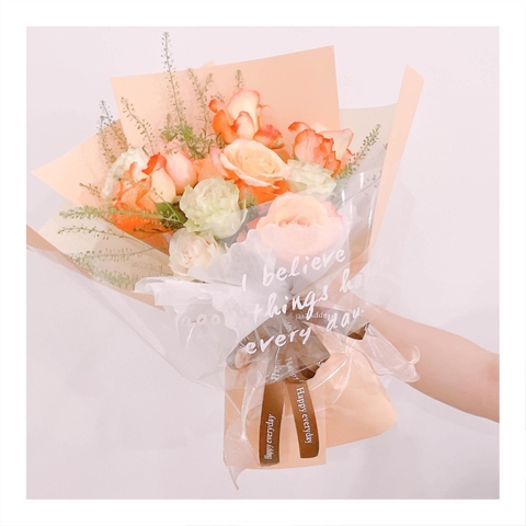 Bó hoa tươi tone cam