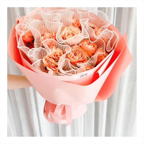 Bó hoa tươi tone cam