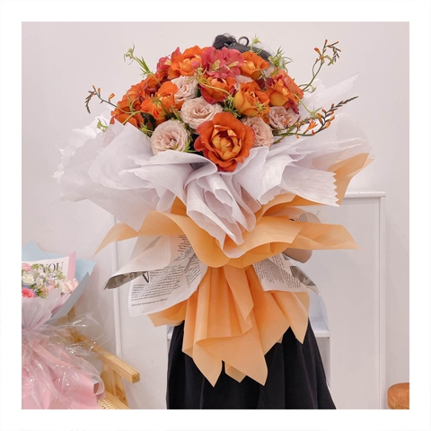 Bó hoa tươi tone cam