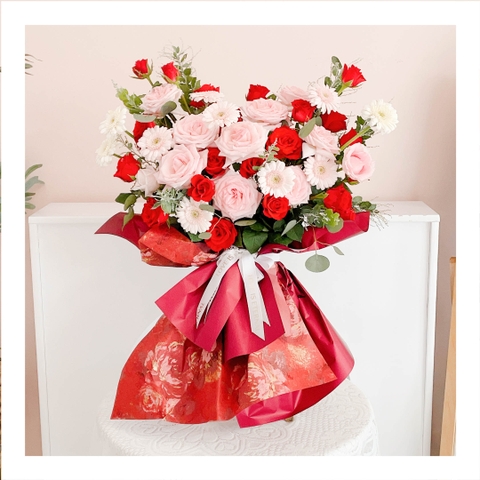 Bó hoa tươi tone hồng mix