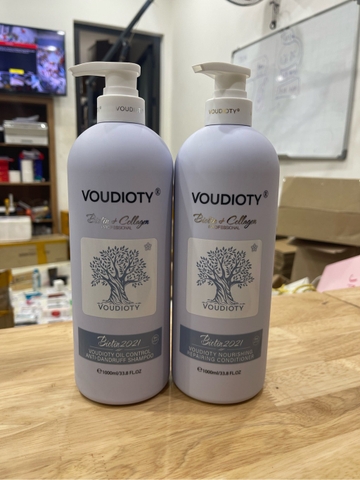 e57 - BIOTIN - Combo Dầu Gội + Dầu Xả 1000ml - 2021 (Màu Tím)