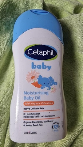 e594 - Dầu massage dưỡng ẩm làm dịu da bé với hoa cúc Calendula Hữu Cơ Cetaphil Baby Moisturising Baby Oil 200ml