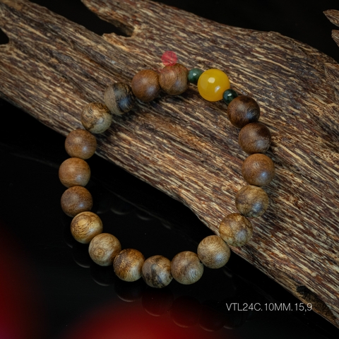 Vòng tay Trầm Hương tròn 10 li cận chìm mix Hổ Phách